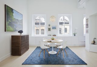 The Complete Dwell Guide to Eames Shellspotting - Photo 3 of 9 - In a renovated Tribeca loft, Eames shell chairs surround a Saarinen Tulip table from Knoll. When architect Matthew Miller of New York firm StudioLAB gutted the space, some of the original details—like the windows—remain.