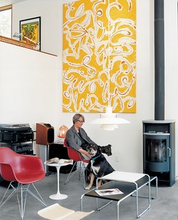The Complete Dwell Guide to Eames Shellspotting - Photo 8 of 9 - An earthy Mexico abode gets a dose of midcentury industrial design with two red Eames shell chairs.
