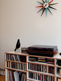 In this Bratislava apartment an Eames bird keeps watch over the record collection.