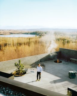 The courtyard extends the living area outdoors and is also home to Martin's tree "Bruce the Spruce".