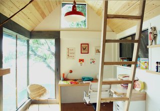Tiny Studio Cabin by Hinterland Design - Photo 1 of 3 - Reclaimed materials like salvaged windows and doors kept costs down, while white paint, bright customized workspaces, and custom millwork keeps things airy on the interiors.
