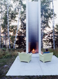 Philippe Starck’s outdoor chairs for Kartell provide cozy fireside seating. These and the sofa version were selected by Salmela. "They’re very much an art form," he says.