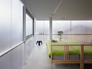 The Home That Glows in the Dark - Photo 3 of 5 - The owners, who are a couple with three children, requested a bright home with a gentle, pervasive light that is far from cold.