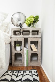 A Gut Renovation Transforms a Tiny Manhattan Apartment - Photo 6 of 8 - The nightstands were fashioned from concrete blocks that were rescued from the street outside the building. Photo by Alan Gastelum.
