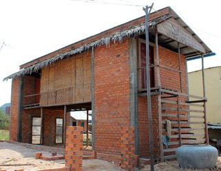 Open Embrace by Keith Greenwald and Lisa Ekle<br><br>"The materials of the house are familiar and largely produced locally, stimulating economies and connecting communities," says Greenwald.<br><br>Photo provided by Building Trust International