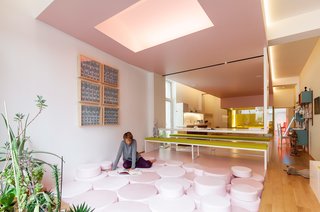 An artist and an architect built this 6,000-square-foot creative dreamworld packed with a tropical garden, neon rooms, and more, inside an Antwerp warehouse.