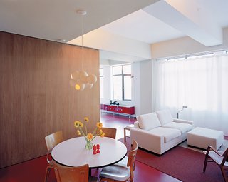 Urban Usonian - Photo 5 of 5 - If Dayton is in the middle of a project, a large sliding door closes off the space entirely.