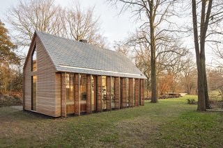 Building atop the foundation of a previous greenhouse was a cost-cutting measure; it allowed the project to be considered a renovation and thereby qualify for a temporary tax reduction. Its traditional, gabled form also pays homage to the original structure.