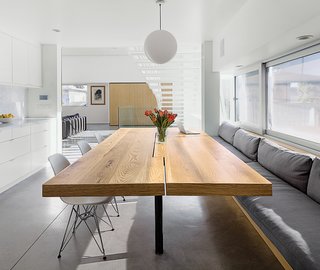 A Minimalist Duplex in Venice, California - Photo 5 of 9 - Don designed and built the white-oak kitchen table, which is cantilevered so knees don’t bump the underpinnings.