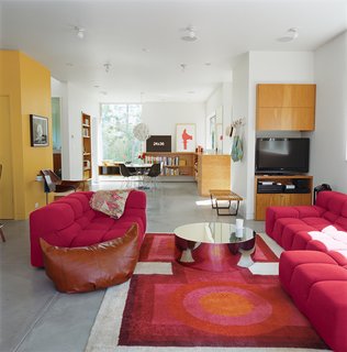 Grunbaum was unafraid of a little color, as his living room proves. It includes a coffee table by Mockett and a Tufty-Time sofa by Patricia Urquiola for B&B Italia.