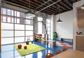 Natural light floods the interior thanks to Solatubes. Barn lights from HiLite offer additional illumination. Curtiss left the Ultratouch blue denim insulation exposed in the ceiling. "We asked the insulation supplier if we could check the denim batch colors," she says. "We didn't want black mixed in with the washed blue color. He thought we were crazy."