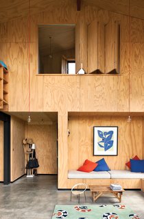 Warm FrontAuckland’s climate is relatively mild, but Davor and Abbe decided not to scrimp on insulation, installing fiberglass batts with R-values above building code requirements in the ceiling and the walls. This, combined with the home’s concrete floor (with standard polystyrene insulation) that retains solar heat, means Davor and Abbe only use their New Zealand–made wood-burning Warmington Studio fireplace in the coldest months.<br><br>warmington.co.nz<br><br>All of the LightsDavor and Abbe created their striking living-room lights—colored cords with exposed bulbs—by calling on a number of different suppliers to put together a look that suits their home’s pared-down aesthetic. The cord for their electrical cables is from Frinab in Sweden, and they teamed the lights with stainless-steel switch plates by Forbes & Lomax sourced through Abbe’s site, Piper Traders.<br><br>frinab.se<br><br>forbesandlomax.com<br><br>pipertraders.co.nz