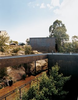 The Kingston House abuts a rock shelf upon which architects Aaron Roberts and Thomas Bailey once sat, dreaming up ideas for the design.