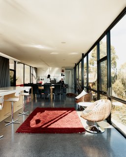 The concrete floor acts as a giant thermal bank, storing solar heat well into the evening.