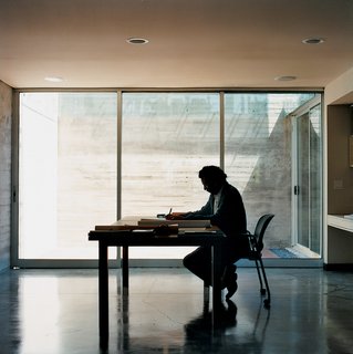 Sebastian's office is downstairs in a long, open space that doubles as a playroom.