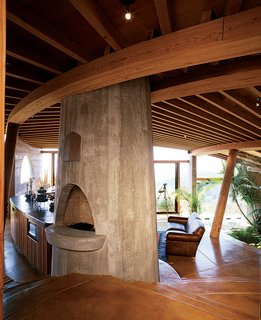 The interiors of many of Muennig’s houses emphasize natural building materials such <br><br>as wood, concrete, and stone. Plant life and nature are intrinsic to the Pfeiffer Ridge House IV.