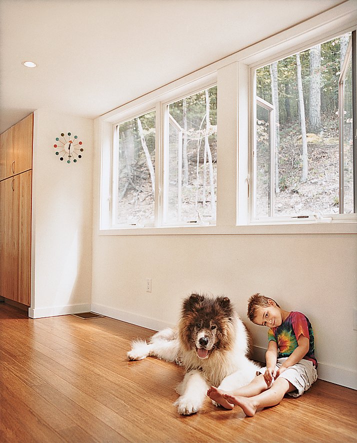 Keeping the home cozy in winter is as easy as snuggling up near the Rais stove or the fluffy pooch.