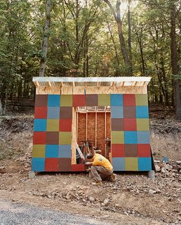 An object lesson in waste not, want not: Brown’s shed was built of leftover siding and houses firewood culled from the site excavation.