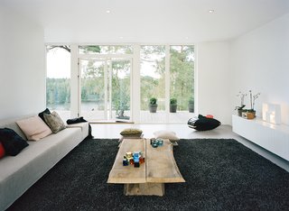 A long, low credenza in the living room keeps the space feeling open and airy.