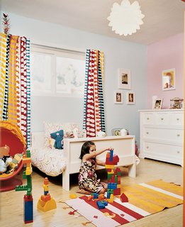 Even in Ella’s room, Ikea chairs and bed mingle with a restored Bertoia child’s chair.