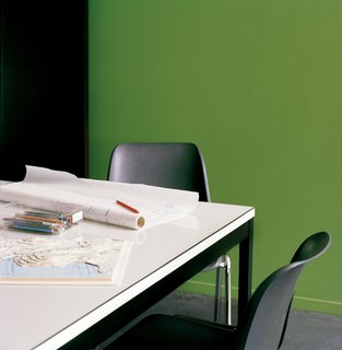 Van Everbroeck’s home office occupies the end of one arm of the building.