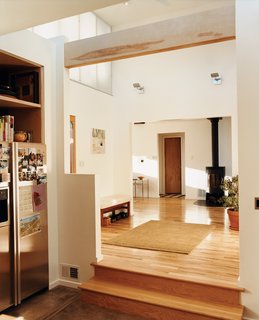 The home's heat comes from a highly efficient wood-burning stove from Rais. Though wood burning is banned in Boulder, the sealed firebox can be used year-round, with combustion technology so effective it's said to release less carbon dioxide than decomposing wood. After logs burn down to embers, the stove continues to radiate heat for hours, reducing the amount of kindling required to keep the place warm.