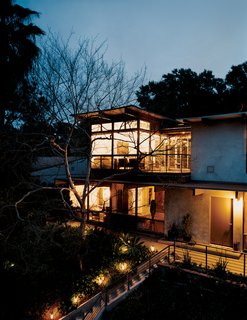 The home doesn't hide its extensive renovations: with all-new windows, installed to maximize both views and solar exposure, it is quite visible where old meets new.