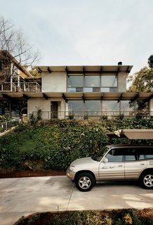 Eric Garcetti's 11-year-old Toyota Rav4-EV sits in front of the house, awaiting its next electric fill-up.