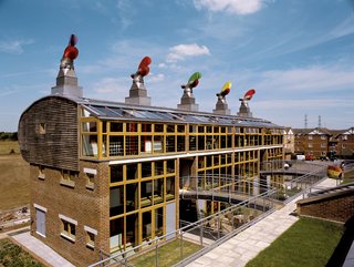 The Beddington Zero Energy Development, or BedZED, by London’s Bill Dunster Architects, exceeds Architecture 2030’s targets, using solar energy and roof gardens. Photograph by Raf Makda/VIEW pictures.