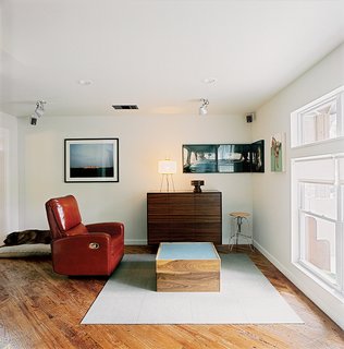 Salvage Love - Photo 6 of 10 - The media cabinet and lightbox coffee table exemplify Dollahite’s furniture-making talents. After finishing the house he founded a studio, Rural Theory, to apply his talents elsewhere.