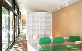 The 400-square-foot interior of the Glassic Flat boasts a bedroom, bathroom, storage, and open living area and kitchen.
