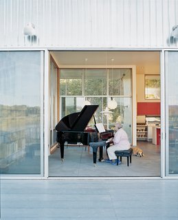 Abiquiu Debut - Photo 5 of 10 - The architects built the house around Madeline’s grand Schimmel piano. But that’s not to say the pair wanted to live in a concert hall. Having a flexible living space and accommodating recital guests took priority.