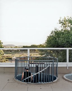 Abiquiu Debut - Photo 6 of 10 - Brigitte descends one of two locally fabricated steel cylinders: her "stairway to the stars."