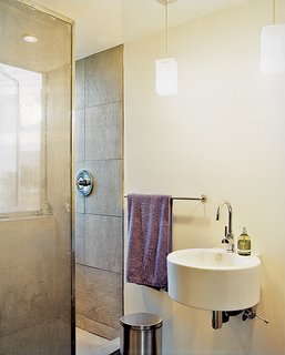 Abiquiu Debut - Photo 9 of 10 - A perforated metal screen serves as a shower curtain.