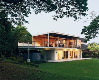 Ipe decking extends from the actual deck to the home's interior.