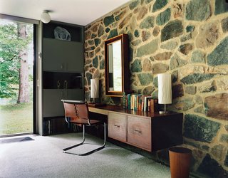 Although the house was refurbished before North bought it in 1996, it still includes some of Breuer's original built-in furniture, including the desk in the bedroom, as well as a chair designed by the architect.