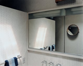 The main bathroom is a vision from the past and hasn't been updated with contemporary fixtures.