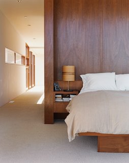 The master bedroom interior is finished with cherry wood.