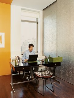 David’s desk, like the other furniture in the apartment, was chosen for both style and wheelchair accessibility.