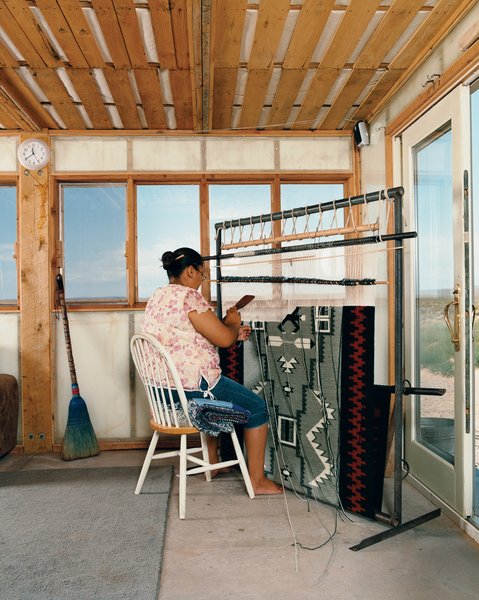 No Grid in Sight - Photo 5 of 8 - Rosie Joe weaves a traditional Navajo rug.