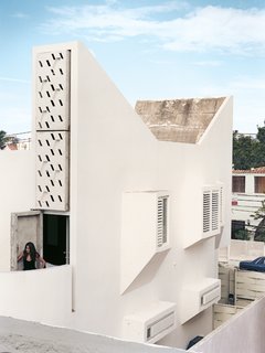 Eneida Nuñez stands on the terrace of the master bedroom.