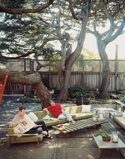 Zelen (left) and Lloyd-Butler take advantage of their shady outdoor space.
