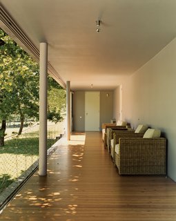 The veranda is the Valley House’s defining feature and serves as a communal space for the family to sit and enjoy nature. The more traditional rattan furniture fits well with Vaz’s local vernacular, as the Portuguese were the first to bring rattan to the West from the East.