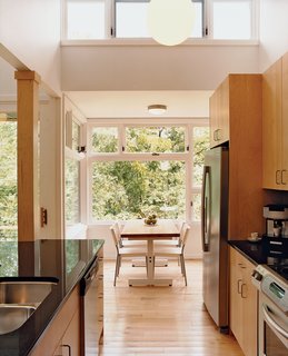 Part of the Plan - Photo 3 of 4 - The kitchen leads into the dining area, which offers stunning views of the King’s River that flows past the house.