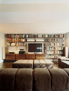 Atlas shelving provides the framework for Farnham’s entertainment center. Almost 100 square feet of Patricia Urquiola’s Tufty-Time sofa for B&B Italia provides ample space to stretch out.