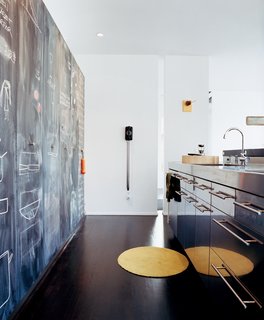 The Andréns’ ingenious use of affordable materials is perhaps best illustrated in their kitchen, where all the cabinets and even the faucet are from IKEA.