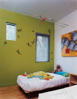 Baton Rouge Oasis - Photo 13 of 13 - The boys’ bedroom is outfitted with custom beds designed by Baird’s studio.