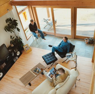 A half floor upstairs overlooks the spacious living area where Bill and his sons relax.