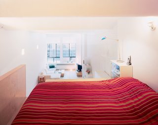 "The sense of fragility is kind of nice," says Woo of the glass pane that forms the bedroom wall. "I was seriously considering translucent glazing. That would still have let the light come through, and might have created a more cozy space and given privacy. But I think this is fine."