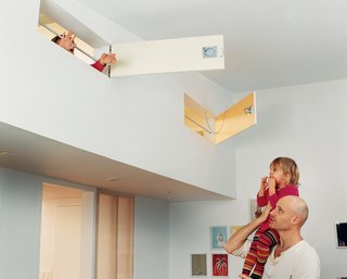 "The kids can look down into the sitting room or out the windows of their rooms into the park," says Matthew Baird of the children’s lofts with their shiplike hatches. "It adds a layer of complexity to the design."
